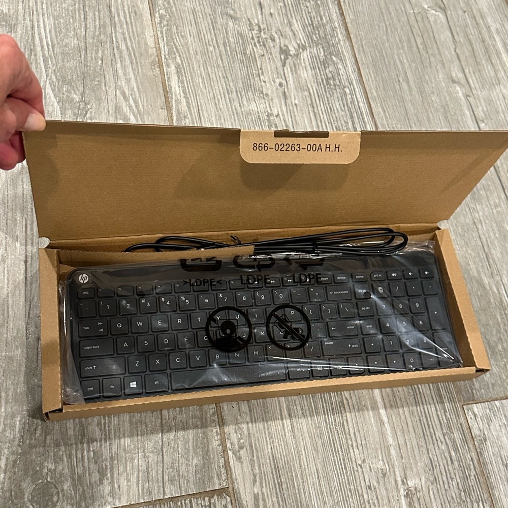 HP Black USB Keyboard with Sleek Design and QWERTY Layout